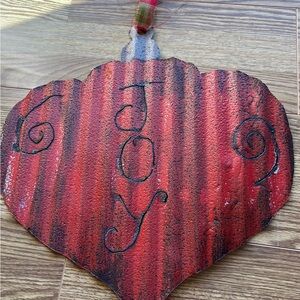 “ JOY “ Christmas  sign made of tin.